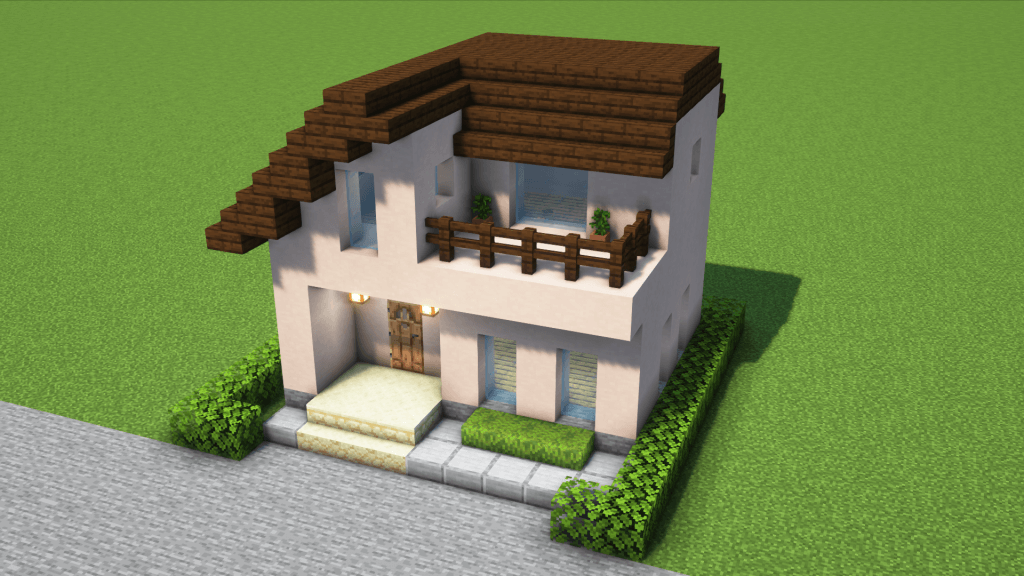 コンパクトでシンプルな木の屋根の白い家
