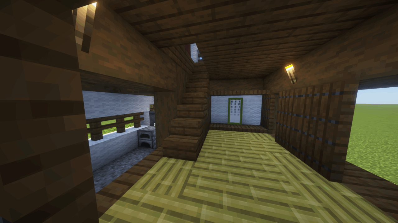 内装1階。畳と掛け軸、台所のある和室。