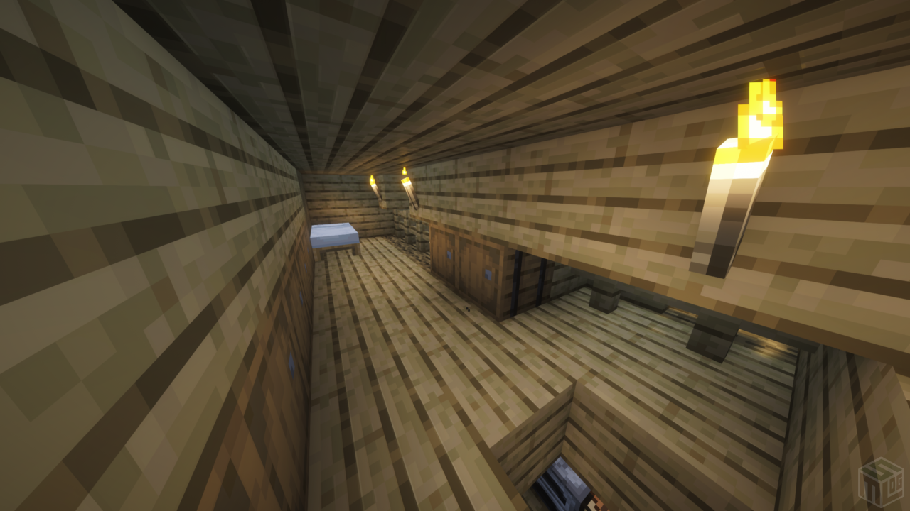 内装2階。ベッドと樽